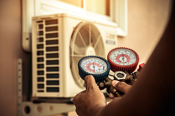 Professional Hvac Maintenance technician working in Readville, MA
